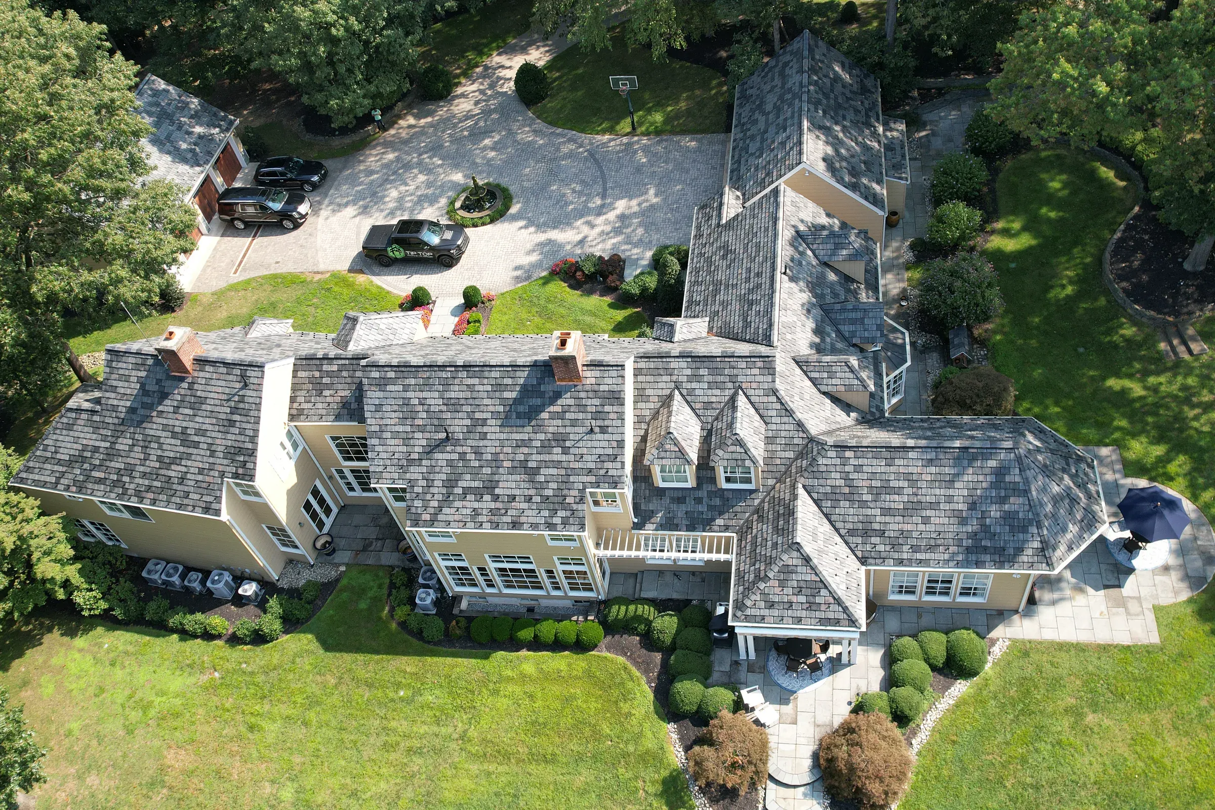 Synthetic slate roof installed on a residential home from above