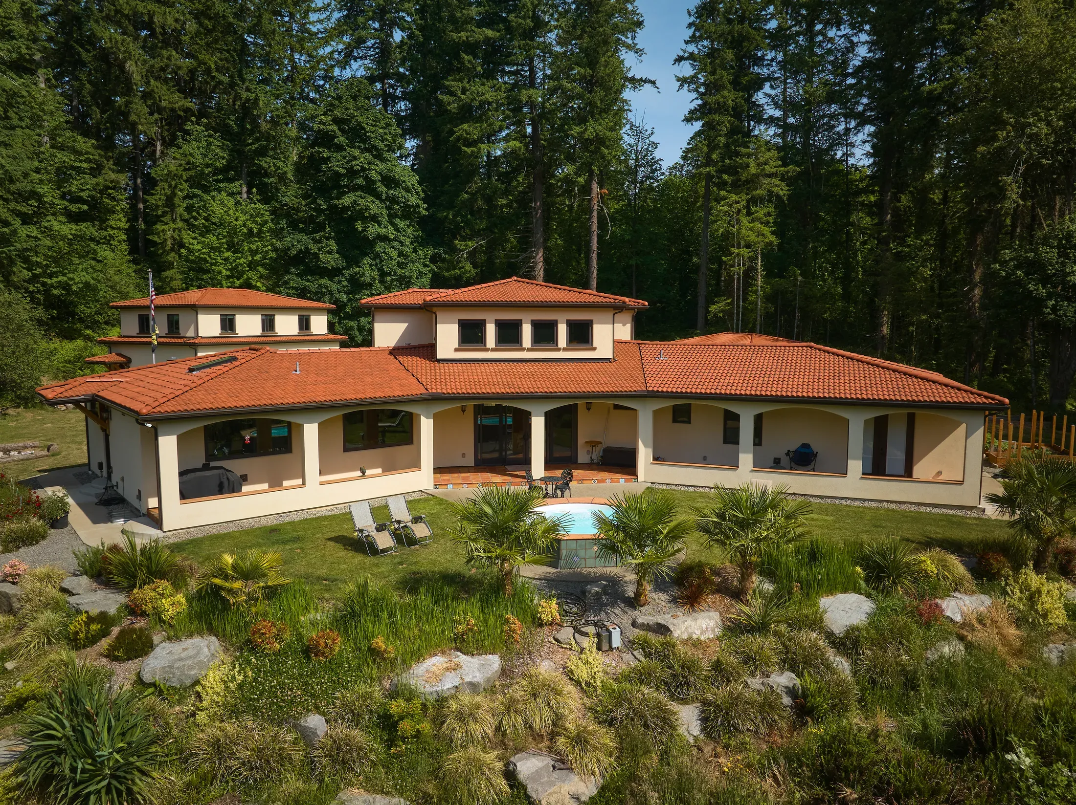 Brava Spanish Barrel Tile roofing installed on a residential home with a warm clay barrel profile
