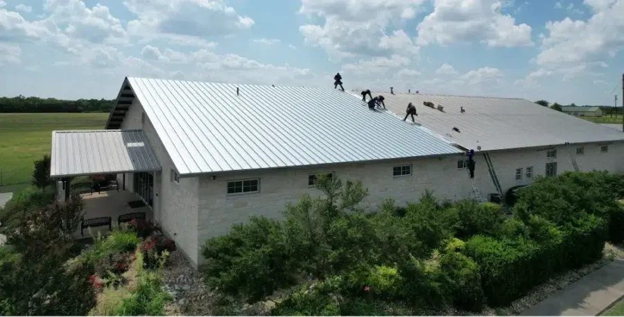 Ark crew replacing a commercial metal roof system in Leander