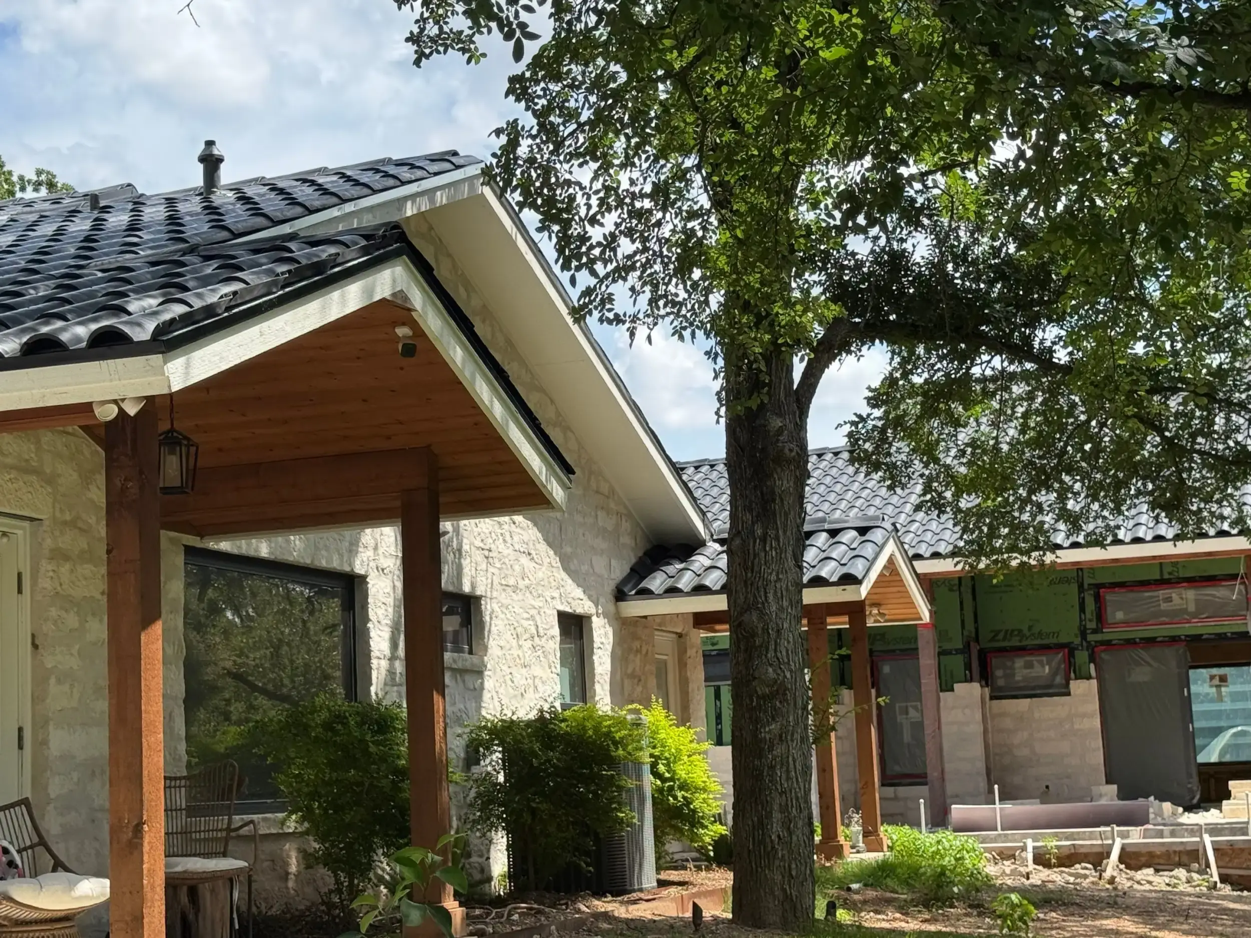 A Central Texas home with a finished tile roof installed by Ark Roofer
