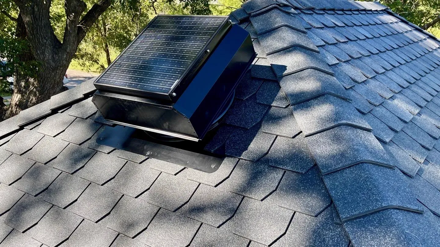 Solar-powered attic fan installed on a Central Texas shingle roof